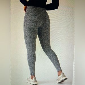 Athleta- delancy textured moto tight, size XXS, color is black braiden